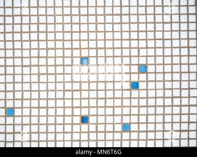 Background from a white decorative square tile for external work. Stock Photo