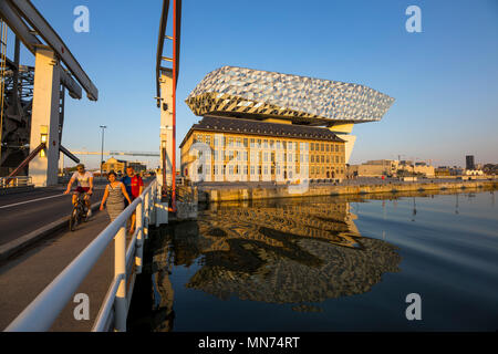 The Antwerp Port Authority building, in Antwerp, Belgium, former firemen's barracks in the harbor, renovated and fitted with a glass building, in the  Stock Photo