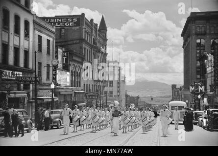 High School Band Marching in Parade, Montana Street, Butte, Montana, USA, Arthur Rothstein for Farm Security Administration, July 1939 Stock Photo