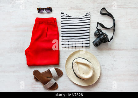 Casual spring/summer female clothing set. Vacation clothes and accessories concept. Stock Photo