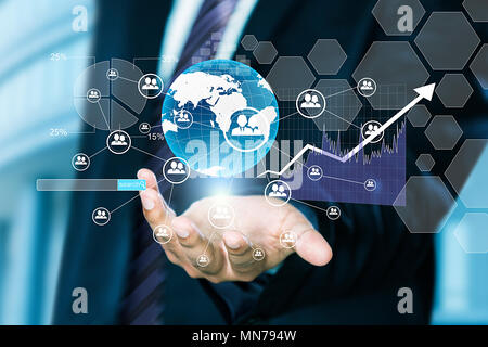 Businessman holding World-Globe in hand stock-Market growth Digital-Graph Illustration -Concept Stock Photo