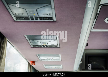 Air conditioning and light panel in a traveling bus Stock Photo