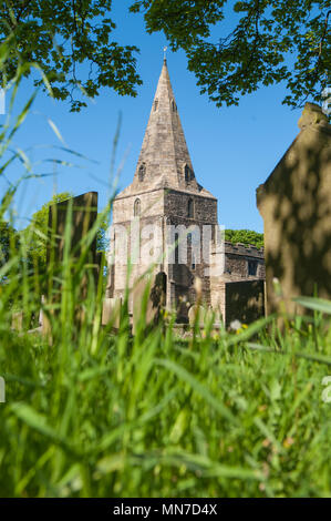 The medieval Church of Saint Peter and Saint Paul in the village of Old Brampton, Derbyshire. Stock Photo