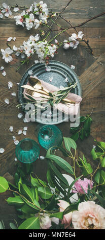 Flat-lay of Table setting with spring flowers, vertical composition Stock Photo