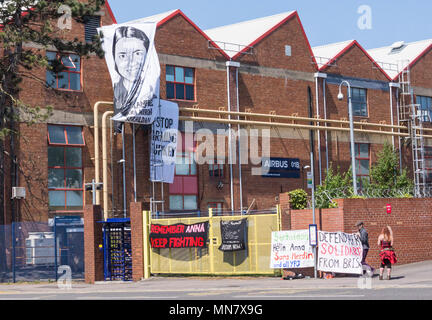 Filton, Bristol, UK . 15th May, 2018. Banner portraits of women killed fighting in syria have been hung from the roof of the airbus company in Filton Protests coincide with Turkeys president Erdogans vist..The protesters say they are friends of Anna Campbell, from Bristol, who died in syria. The protesters believe Airbus is selling arms to the turkish military and that the women on the banners were killed by turkish forces. BAe has issued a statement that their work with turkey complies with defence export controls. Credit: Mr Standfast/Alamy Live News Stock Photo