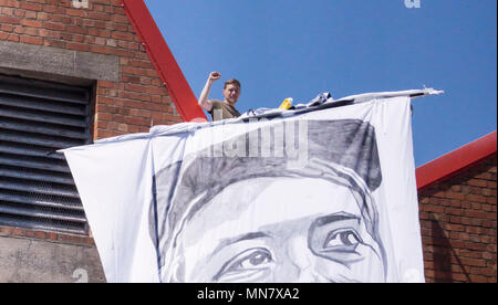 Filton, Bristol, UK . 15th May, 2018. Banner portraits of women killed fighting in syria have been hung from the roof of the airbus company in Filton Protests coincide with Turkeys president Erdogans vist..The protesters say they are friends of Anna Campbell, from Bristol, who died in syria. The protesters believe Airbus is selling arms to the turkish military and that the women on the banners were killed by turkish forces. BAe has issued a statement that their work with turkey complies with defence export controls. Credit: Mr Standfast/Alamy Live News Stock Photo