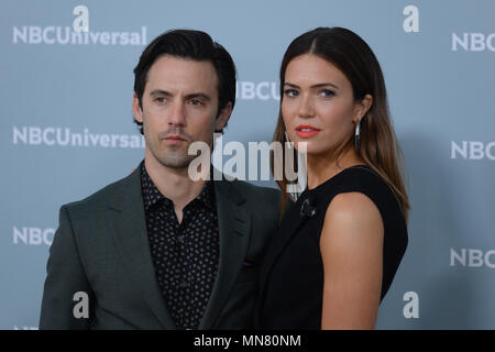 Milo Ventimiglia and Mandy Moore attend the Unequaled NBCUniversal Upfront campaign at Radio City Music Hall on May 14, 2018 in New York. Stock Photo