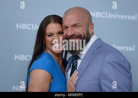 Stephanie McMahon and Triple H attend the Unequaled NBCUniversal Upfront campaign at Radio City Music Hall on May 14, 2018 in New York. Stock Photo