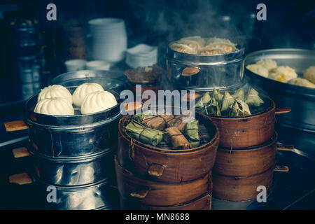 Street food booth selling chinese specialty steamed dumplings in china Stock Photo