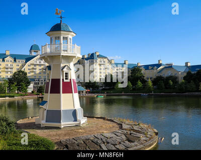 MARNE-LA-VALLEE, FRANCE - July 29th, 2016 – The lighthouse at Lake Disney and Disney's Newport Bay Club at Disneyland Resort Paris. Stock Photo