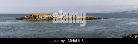 Moelfre Island at Moelfre off the coast of Anglesey, North Wales Stock Photo