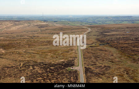 aerial view looking east towards Emley Moor TV mast from a moorland road on the Pennines near Oldham, UK Stock Photo