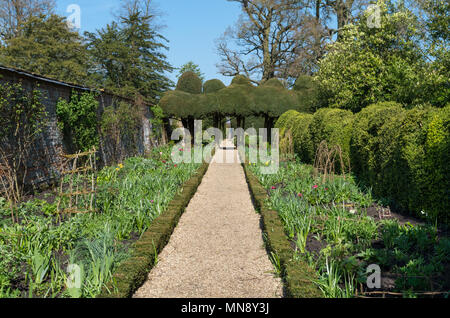 A sunny and warm Spring day in the gardens of the stately home Kelmarsh Hall; Northamptonshire, England, UK Stock Photo