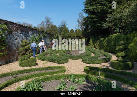 A sunny and warm Spring day in the gardens of the stately home Kelmarsh Hall; Northamptonshire, England, UK Stock Photo