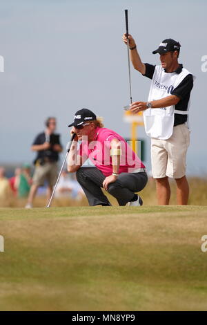 MUIRFIELD, SCOTLAND - JULY 18: Miguel Angel Jimenez at the 11th green, studying his putt during the first round of The Open Championship 2013 at Muirfield Golf Club on July 18, 2013 in Scotland. Stock Photo