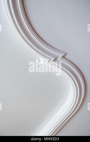Luxury white ceiling design bas-relief with stucco mouldings roccoco element Stock Photo