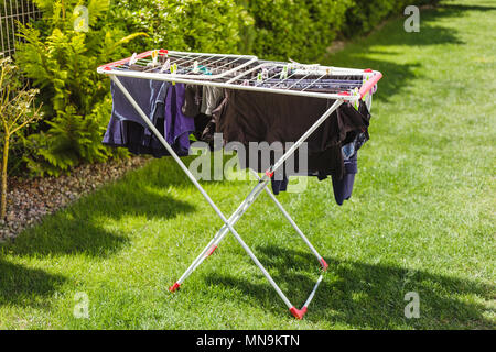 Laundry on the dryer in the garden Stock Photo