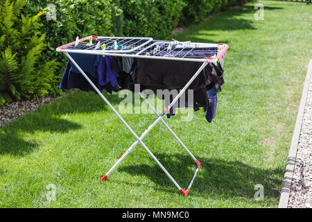 Laundry on the dryer in the garden Stock Photo