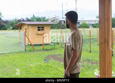 italian young man in his garden Stock Photo