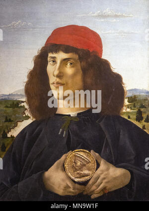 Filippo Lippi - Portrait of a young man holding a medallion - C.1475 - Uffizi Gallery - Galleria degli Uffizi Stock Photo