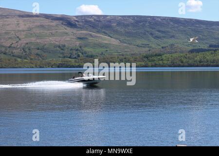 Beautiful Loch Lomond, Scotland, UK on a clear sunny day showing water and mountains in a breath-taking view. A popular tourist attraction and holiday Stock Photo