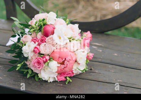 Bouquet of flowers. The bride's bouquet. Bridal bouquet. Floristics. Wedding bouquet from different colors. Stock Photo