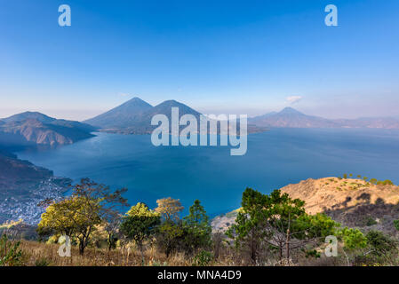 Panorama view of the lake Atitlan and volcanos  in the highlands of Guatemala Stock Photo