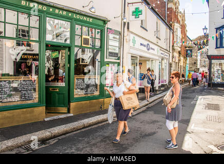 People enjoying a sunny day in Fowey Cornwall England Stock Photo