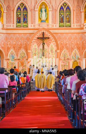 Chantaburi, Thailand - January 1, 2016: Group of pastors walking into Christian beautiful church where Christian people attending religion ceremony in Stock Photo