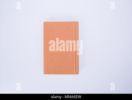 notebook or leather diary and pencil on the blackground Stock Photo