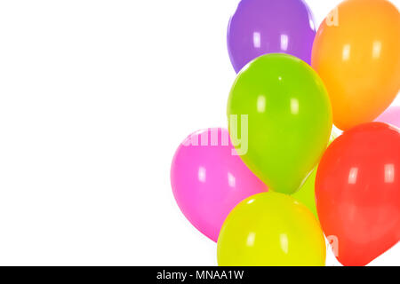 Party decoration concept - mix of colorful balloons isolated on a white background with copy space. Stock Photo