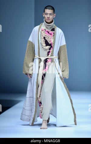 May 14, 2018 - Beijin, Beijin, China - Beijing, CHINA-14th May 2018: A model presents a creation at a show during China Graduate Fashion Week in Beijing. (Credit Image: © SIPA Asia via ZUMA Wire) Stock Photo