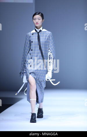 May 14, 2018 - Beijin, Beijin, China - Beijing, CHINA-14th May 2018: A model presents a creation at a show during China Graduate Fashion Week in Beijing. (Credit Image: © SIPA Asia via ZUMA Wire) Stock Photo