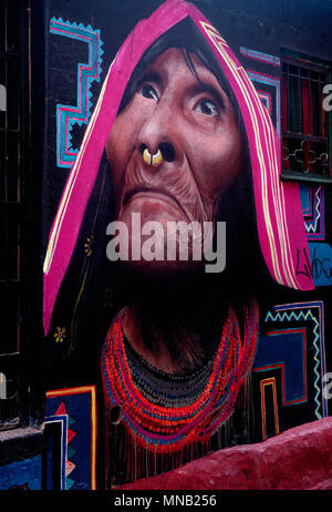 Painting of an old native woman, part of the official and unofficial Graffiti of Bogota is welcomes to add colour to the city, Colombia Stock Photo