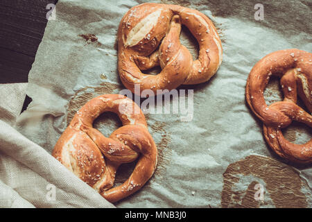 Pretzels From the Oven on Baking Sheet. Rustic Look. Stock Photo