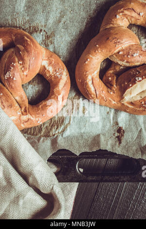 Pretzels From the Oven on Baking Sheet. Rustic Look. Stock Photo