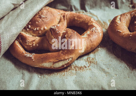 Pretzels From the Oven on Baking Sheet. Rustic Look. Stock Photo