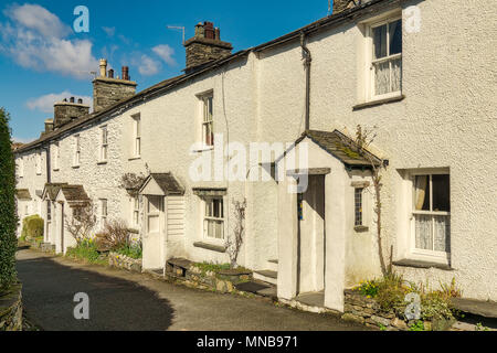 A row of whitewashed cottages in Ambleside, the English Lake Dis Stock Photo