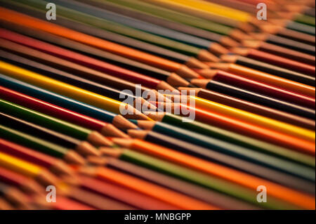 Close-up of multicolored pencils with design elements in rows Stock Photo