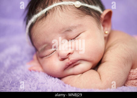 Macro close-up newborn portrait in sleeping time Stock Photo