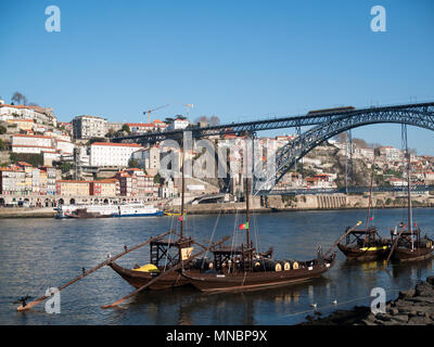 Boats in Douro River by Dom Luis Bridge, Oporto Stock Photo