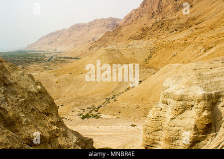 The barren mountainous wilderness at Qumran the historic archaeological site of the Dead Sea Scrolls in Israel Stock Photo