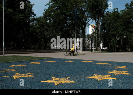 An EU flag installation at the entrance to  Stefan cel Mare Central Park formerly known as Pushkin Park located in Stefan CEl Mare boulevard in the city of Chisinau also known as Kishinev the capital of the Republic of Moldova Stock Photo