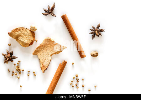 Top view of cinnamon stick and dried ginger isolated on white background Stock Photo