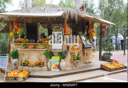 An outdoor fruit bar selling squeezed or pressed fruit and vegetable drinks at the Yardenit baptismal Centre on the River Jordan in Israel Stock Photo