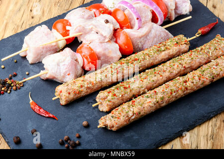 Kebab, threaded on skewers pieces of meat Stock Photo