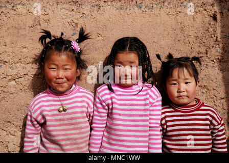 Tibetan little girl in Thangka festival Stock Photo