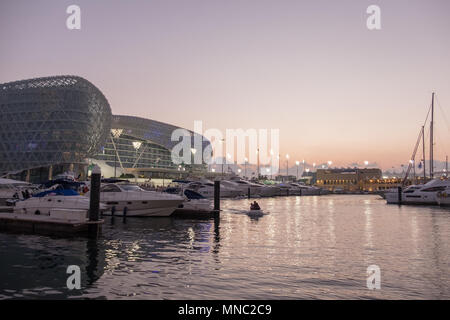 A view of the Yas marina and the Yas Viceroy hotel, Abu Dhabi at dusk Stock Photo