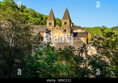 Beautiful hillside view of Conques, medieval village, Occitanie, France. Stock Photo