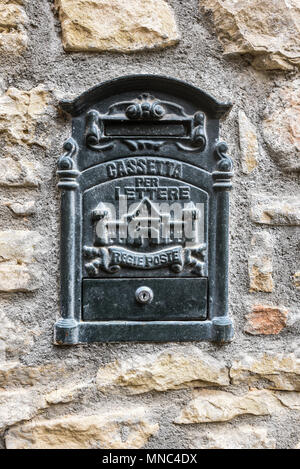 A mailbox on the wall of a house in a village in the French part of the Pyrenees Stock Photo
